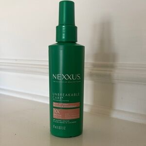 Nexx Unbreakable Care Root Lift Spray - green bottle.